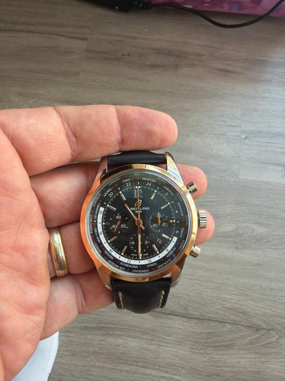 Breitling Transocean Chronograph Unitime UB0510 Steel & 18K Rose Gold Black Dial